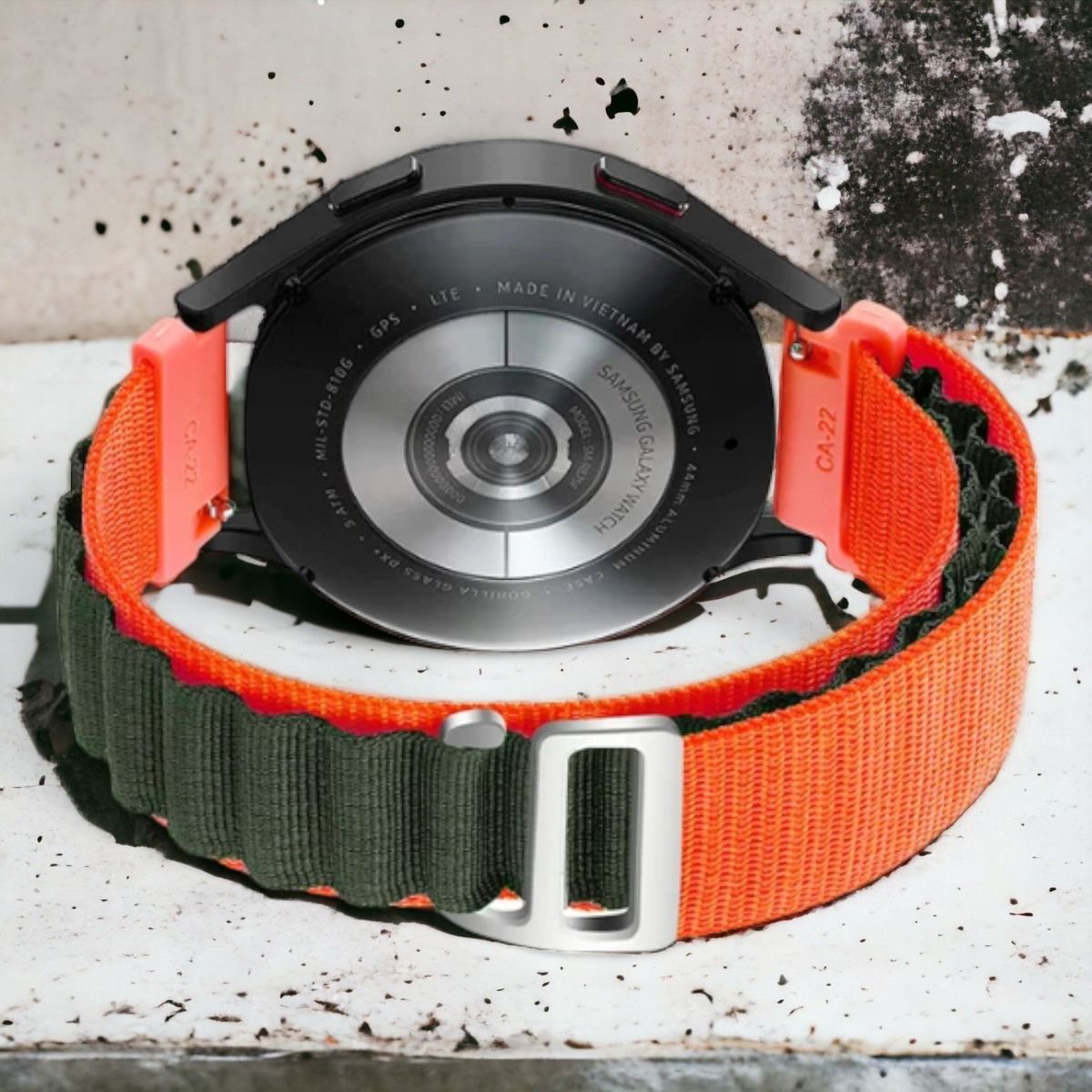 Kellonranneke opillapop| vihreä + oranssi