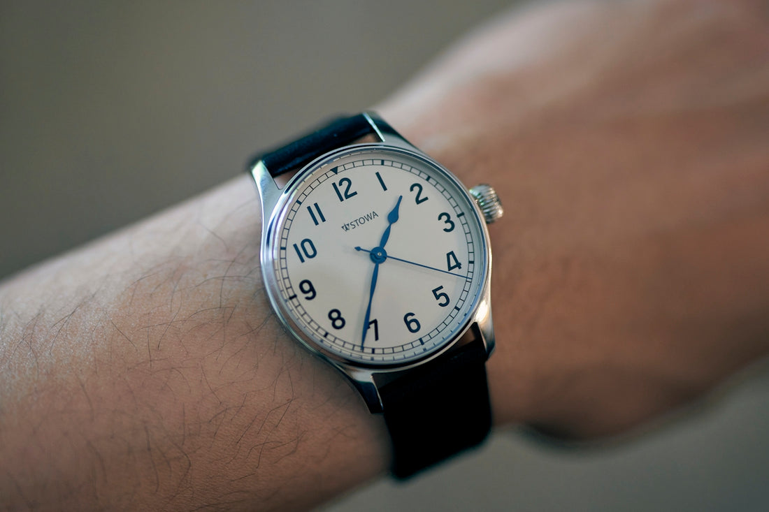 a close up of a person's wrist with a watch on it