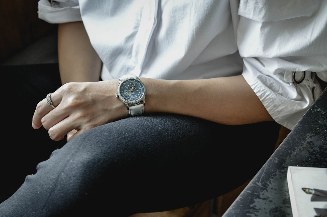 a close up of a person wearing a watch