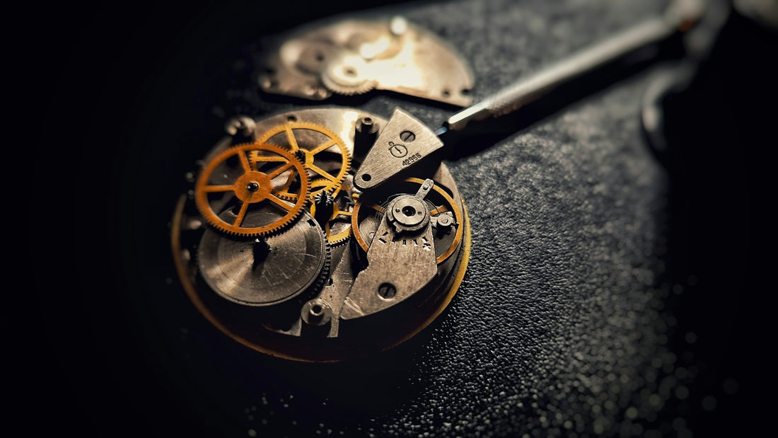 A close up of a pocket watch on a table