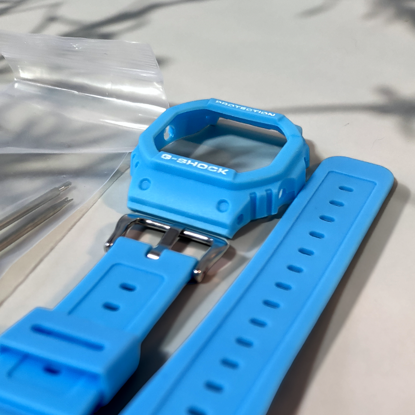 Kellonranneke resiini-silikooni  | casio g-shock modaussetti vaalean sininen